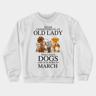 Never Underestimate An Old Lady Who Loves Dogs And Was Born In March Crewneck Sweatshirt